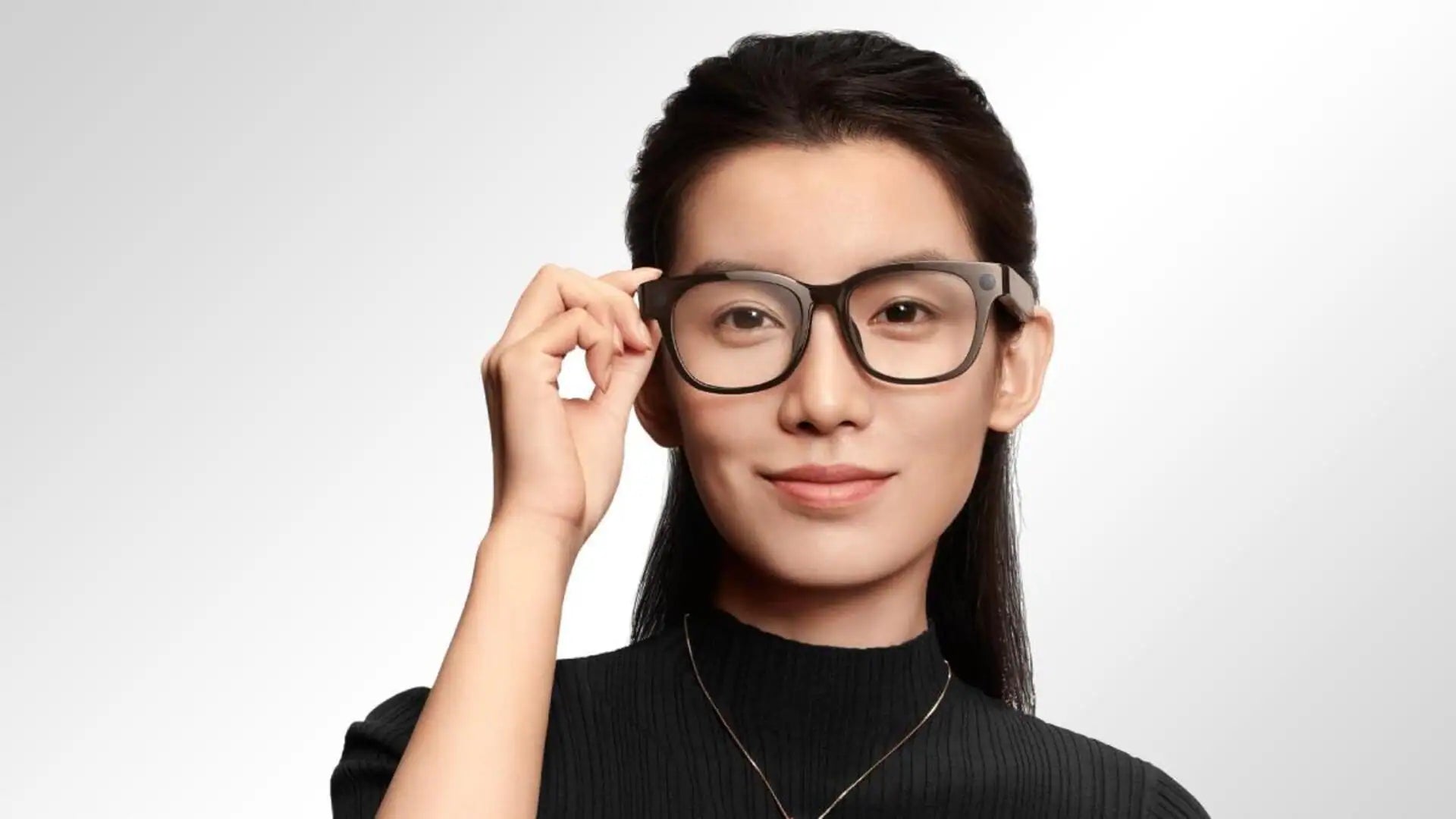 Model wearing Xiaomi AI Glasses facing the camera directly 